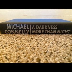 “A darkness more than night”